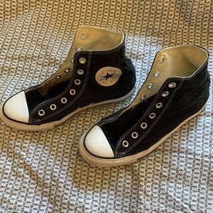 Converse high-top shoes.